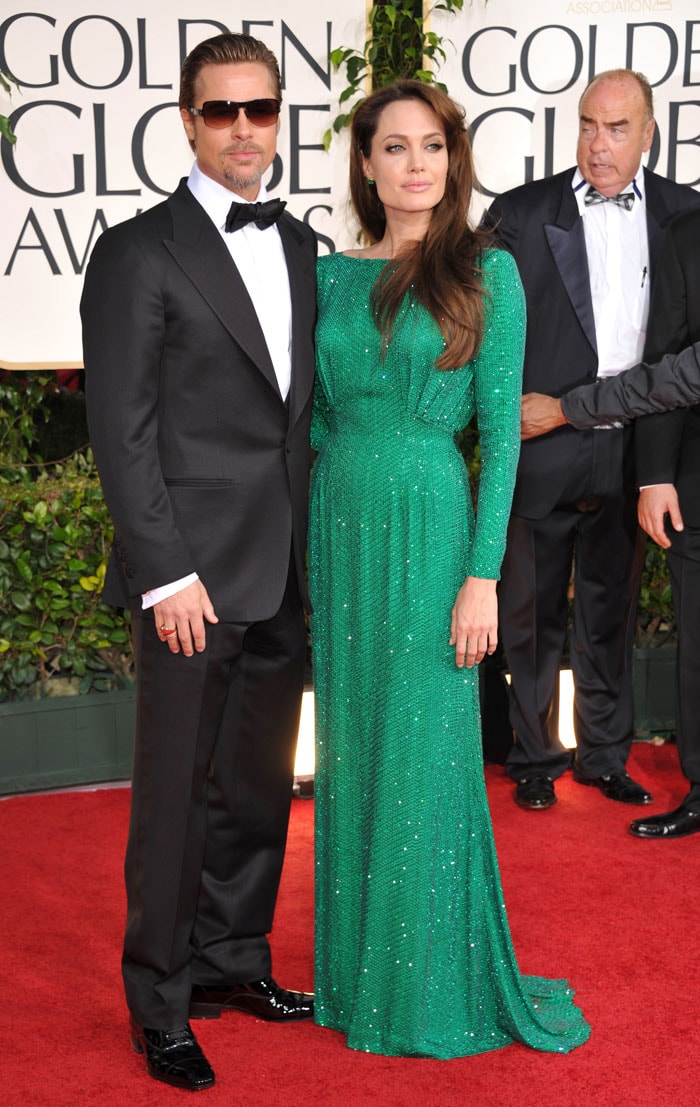 Angelina Jolie and Brad Pitt who looked handsome in a Tom Ford tux.