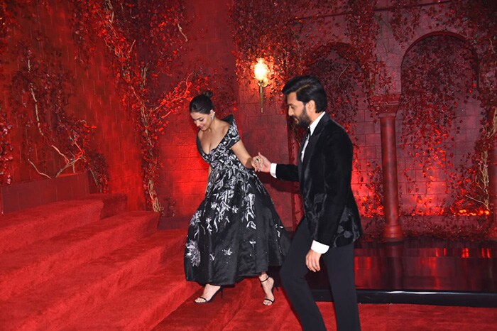 Genelia D'Souza did both bling and black, husband Riteish went al black.