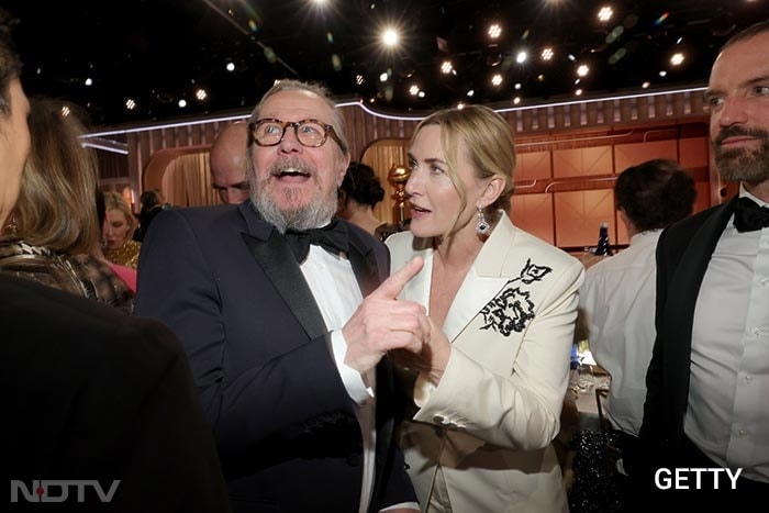 Gary Oldman and Kate Winslet captured in a candid moment