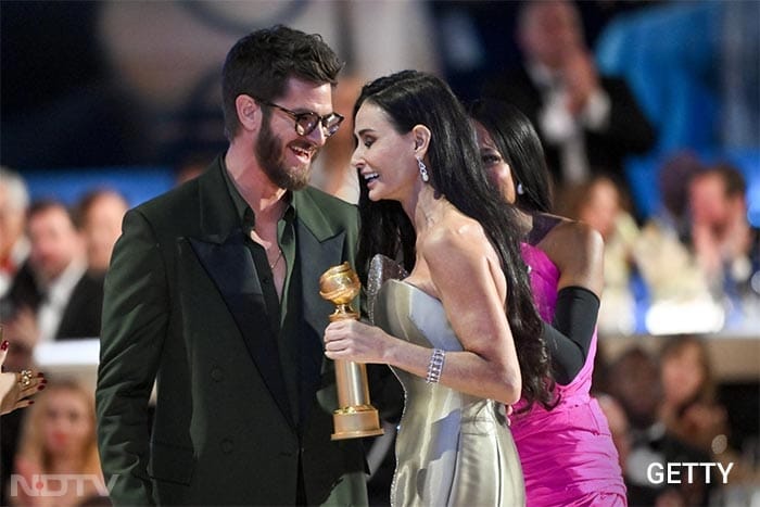 Andrew Garfield and Demi Moore all smiles, as the latter won big this year