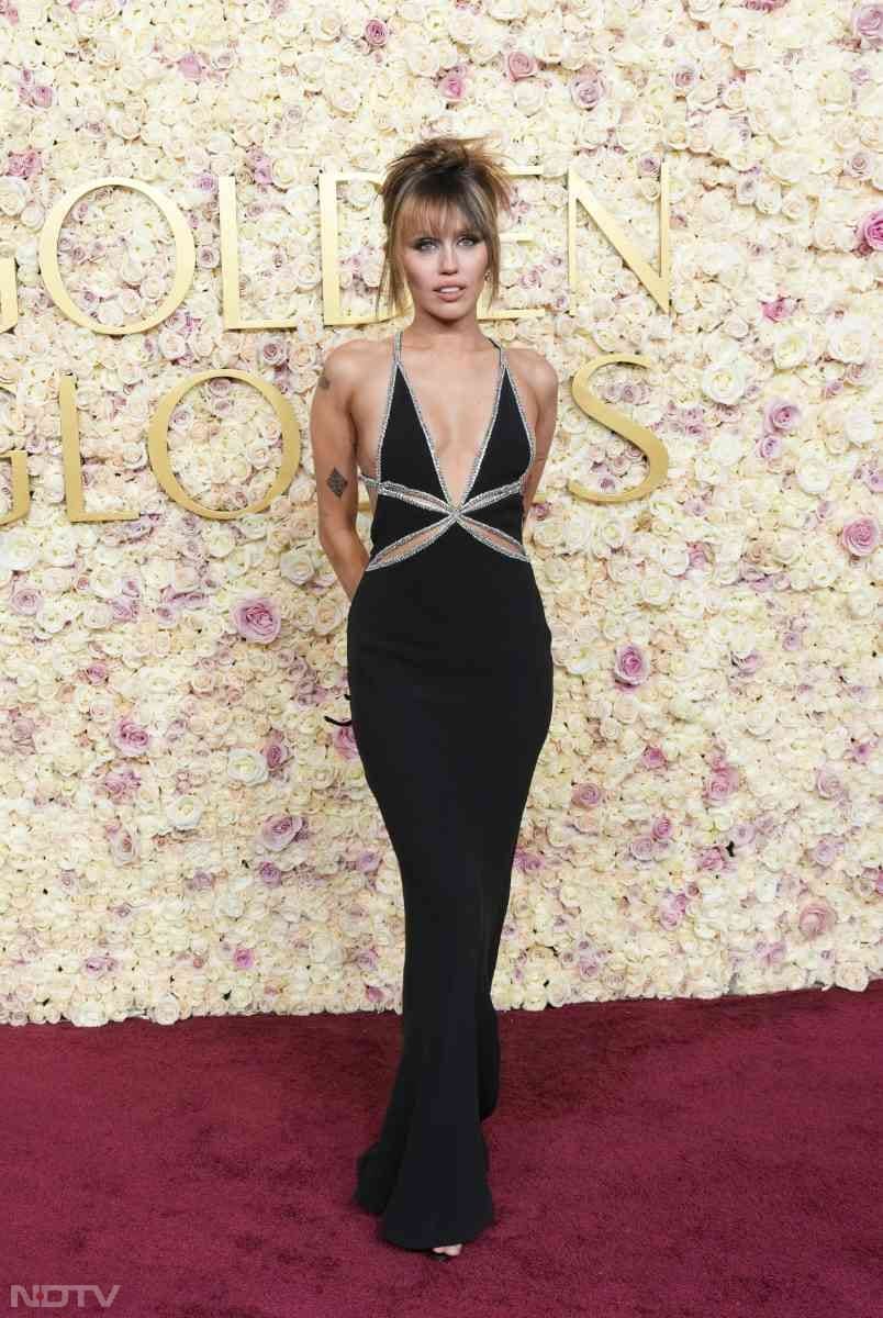 Miley Cyrus opted for a black gown. (Image courtesy: Getty)