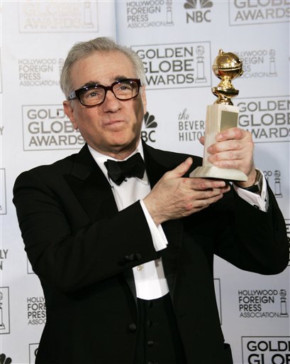Martin Scorsese poses with the award he won for best director for his work on The Departed, at the 64th Annual Golden Globe Awards.