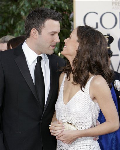 Jennifer Garner, right, and Ben Affleck arrive for the 64th Annual Golden Globe Awards.