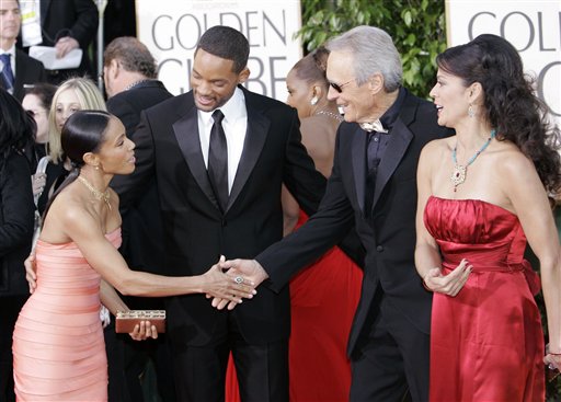 From left, Jada Pinkett Smith, Will Smith, Clint Eastwood, and his wife Dina talk as they arrive for the 64th Annual Golden Globe Awards.