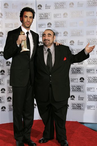 Sacha Baron Cohen poses with his co-star, Ken Davitian, after winning the award for best actor in a musical or comedy for his work in Borat: Cultural Learnings of America for Make Benefit Glorious Nation of Kazakhstan, at the 64th Annual Golden Globe Awards.
