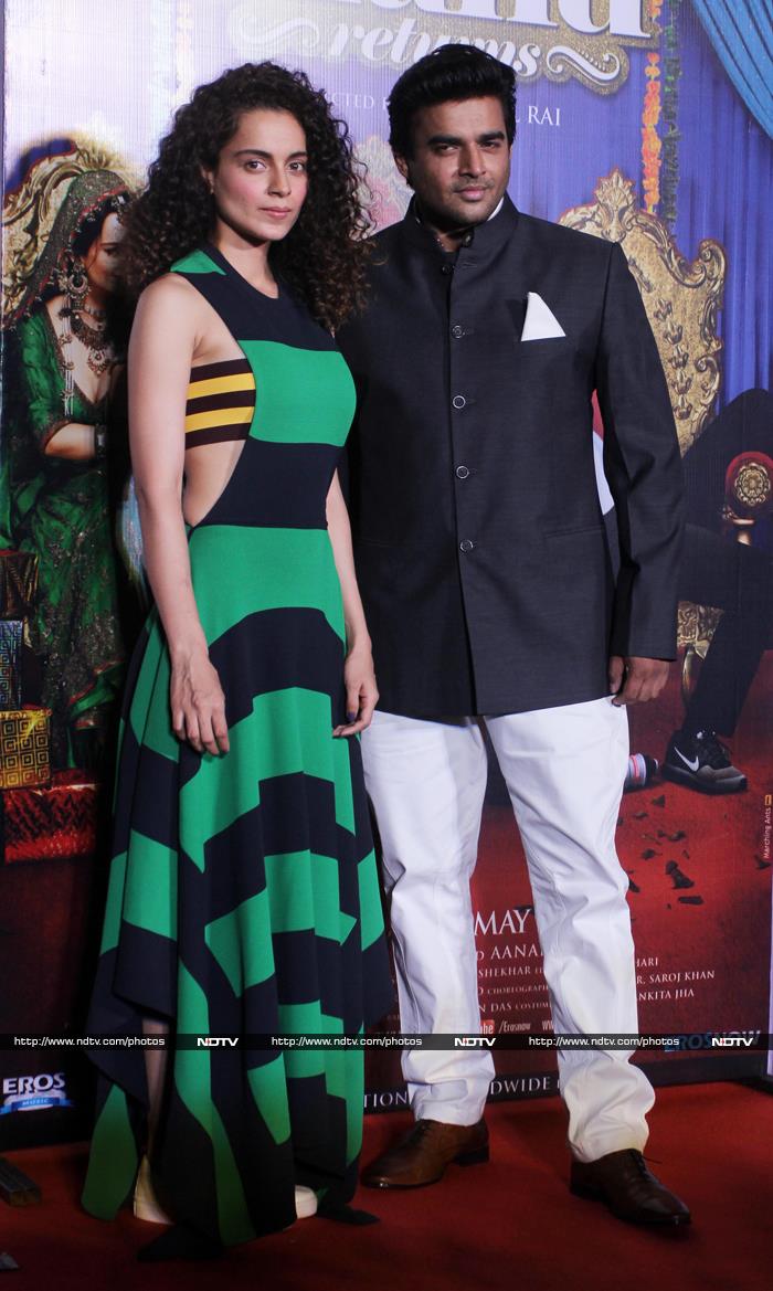 Madhavan looked dapper in formals as he posed with his leading lady for the shutterbugs.