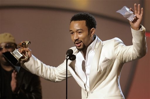 John Legend accepts the award for best new artist at the 48th Annual Grammy Awards.