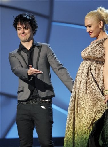 Billie Joe Armstrong of the group Green Day and Gwen Stefani take the stage to make an award presentation at the 48th Annual Grammy Awards.