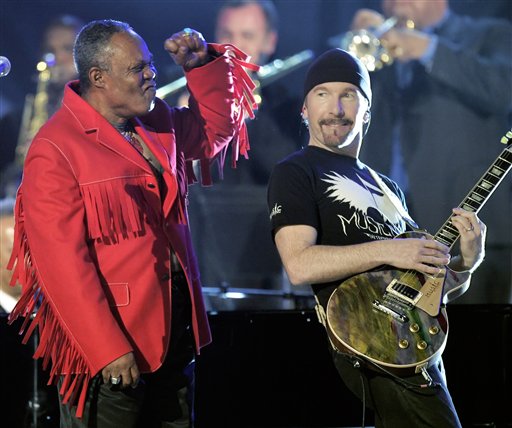 Sam Moore, left, and The Edge from the group U2 perform in a tribute to New Orleans at the 48th Annual Grammy Awards.