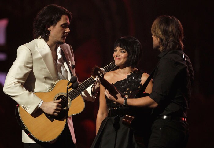 From left, John Mayer, Norah Jones and Keith Urban are seen onstage at the 53rd annual Grammy Awards on Sunday, Feb. 13, 2011, in Los Angeles. (AP Photo/Matt Sayles)