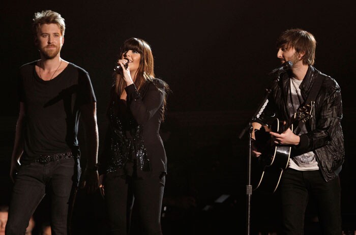 Lady Antebellum, from left, Charles Kelley, Hilary Scott, and Dave Haywood perform at the 53rd annual Grammy Awards on Sunday, Feb. 13, 2011, in Los Angeles. (AP Photo/Matt Sayles)