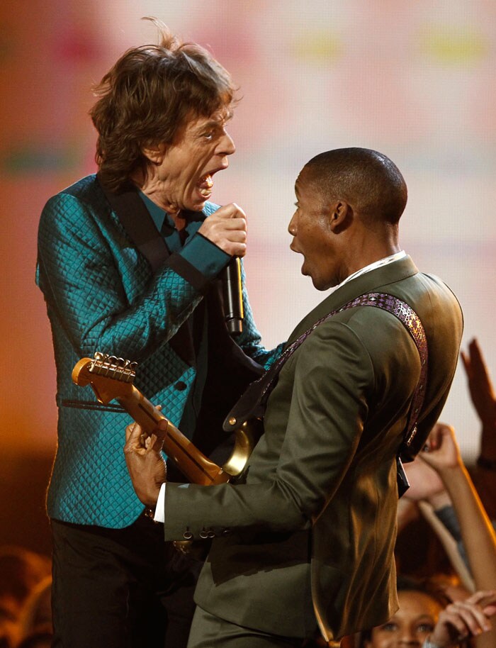 Mick Jagger and Raphael Saadiq perform at the 53rd annual Grammy Awards on Sunday, Feb. 13, 2011, in Los Angeles. (AP Photo/Matt Sayles)