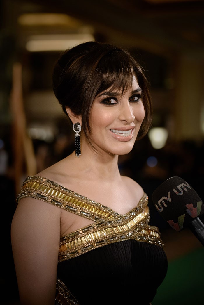 Bollywood stars glitter on the IIFA green carpet