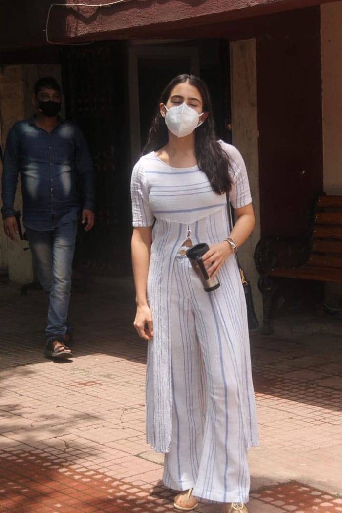 Unlike her colourful athleisure look, Sara Ali Khan looked cute as a button in summery white.