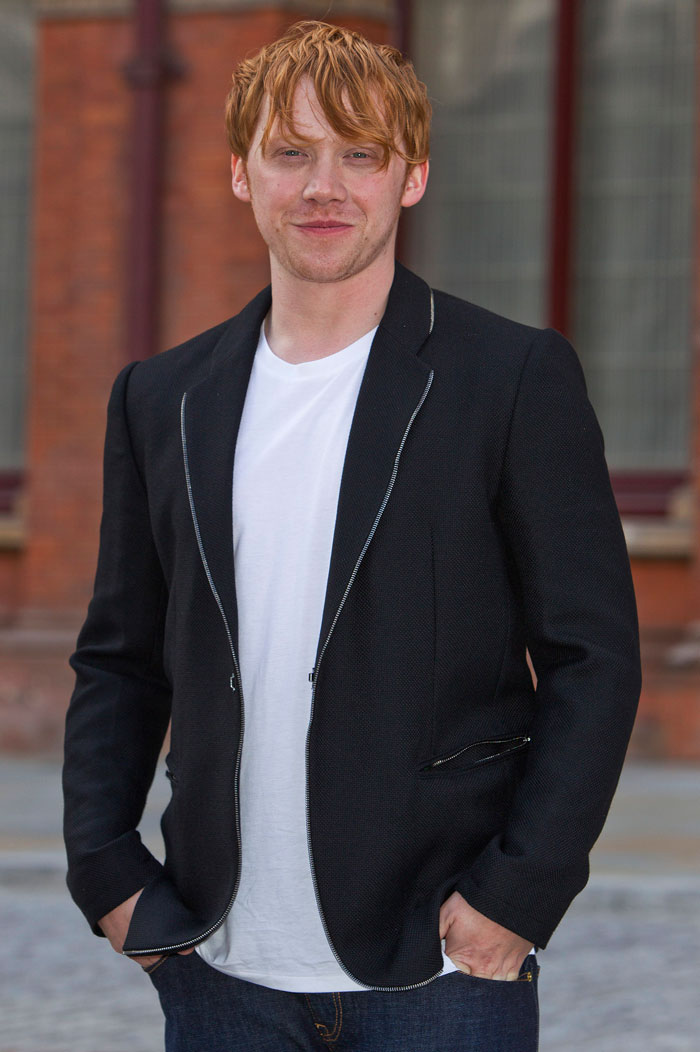 Rupert Grint poses at St Pancras Renaissance Hotel in central London.