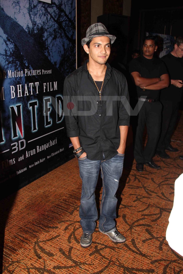 Aditya Narayan finishes the look with a Fedora.