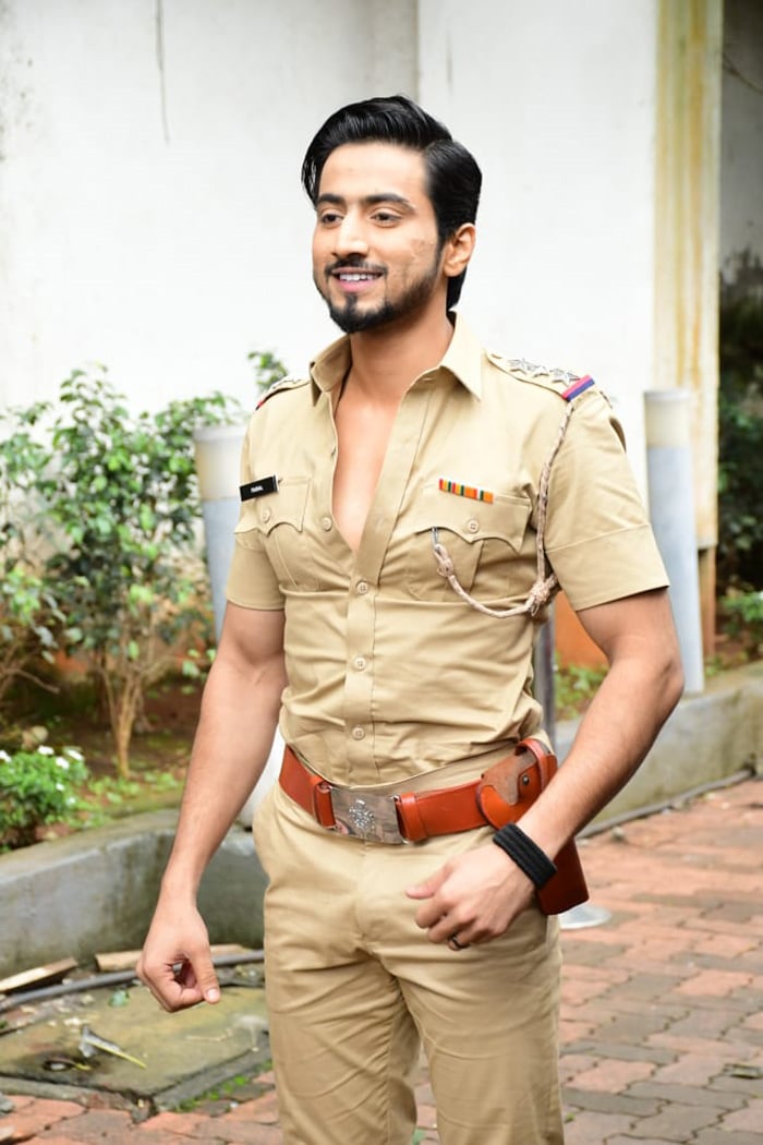 Faisal Shaikh posed for the shutterbugs in a Police uniform.