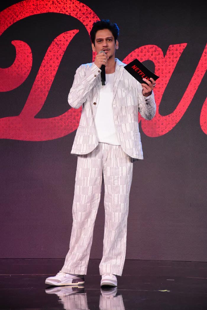 Vijay Varma looked dashing in a grey formal outfit.