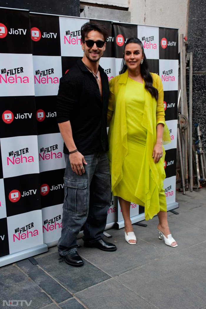 Tiger Shroff and Neha Dhupia posed together for the shutterbugs. (Image Courtesy: Varinder Chawla)