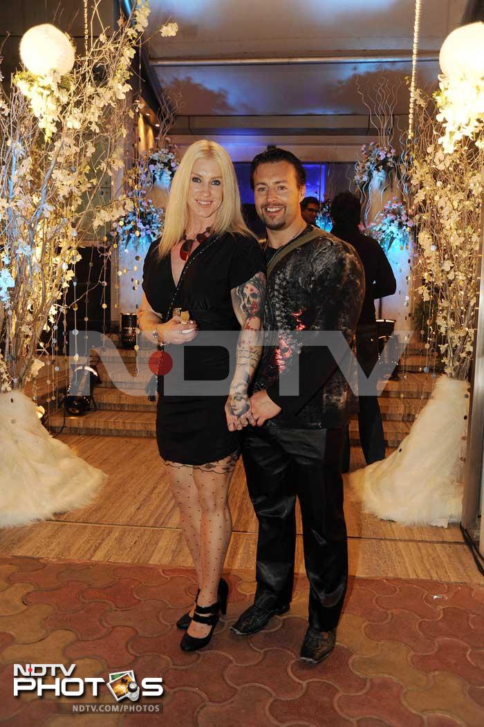 Hrithik's fitness trainer, Kris Gethin, was a part of the celebrations too. Seen here with a friend.