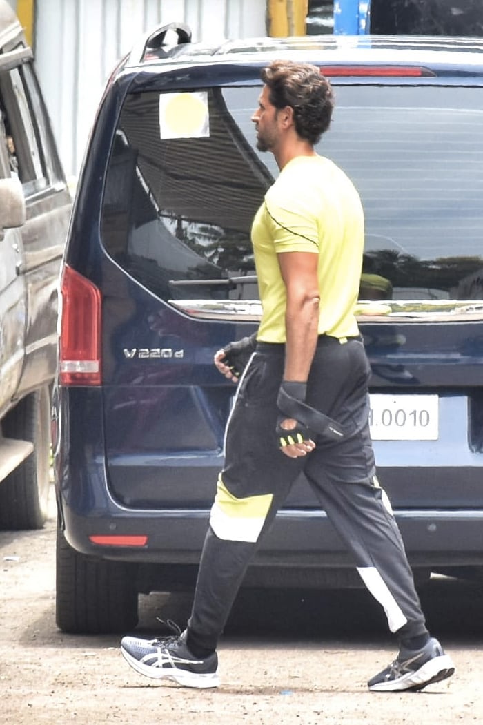 Hrithik picked out a yellow T-shirt and black joggers as he stepped out of his home.