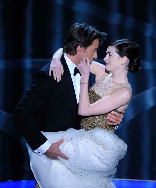 Oscar host Hugh Jackman performs a skit with actress Anne Hathaway during the 81st Academy Awards in Los Angeles.