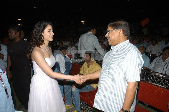 Allu Aravind and Tamanna share a moment.