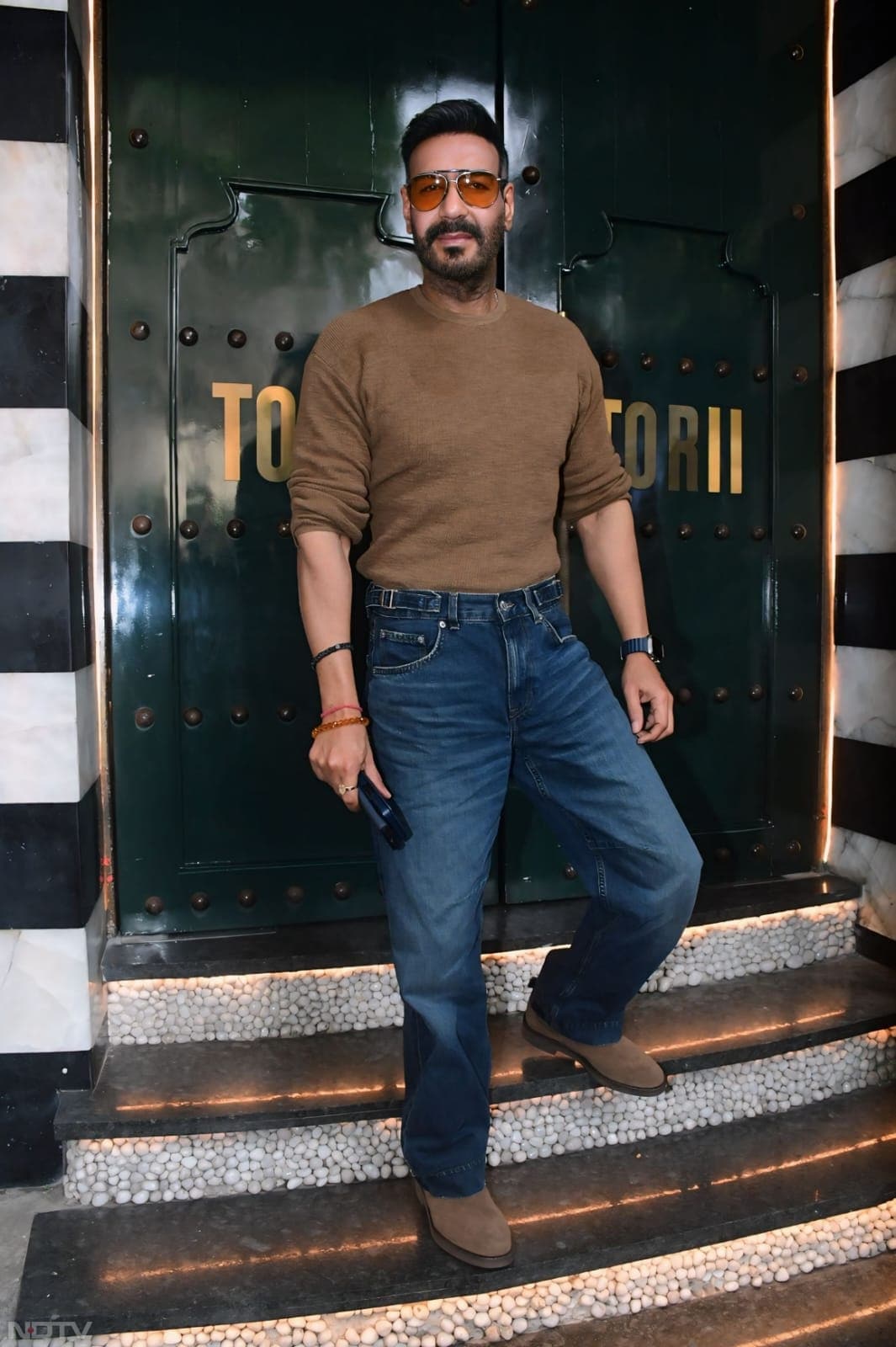 Ajay Devgn AKA Singham sported denims teamed with a brown t-shirt (Image Courtesy: Varinder Chawla)