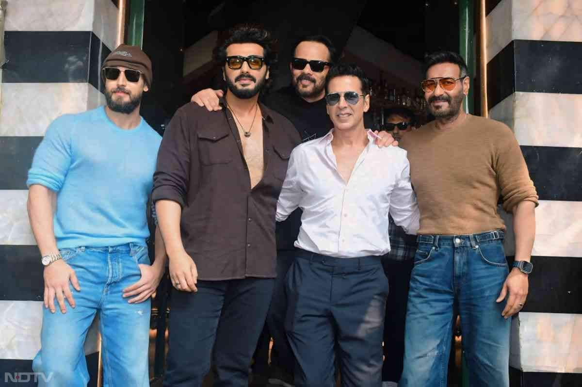 Director Rohit Shetty and Team <i>Singham Again</i> posed for a picture-perfect click (Image Courtesy: Varinder Chawla)