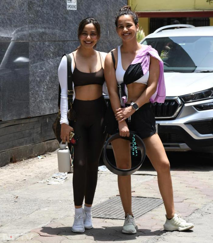 Neha and Aisha Sharma posed for the paparazzi outside a gym in Bandra. (Image Courtesy: Varinder Chawla)