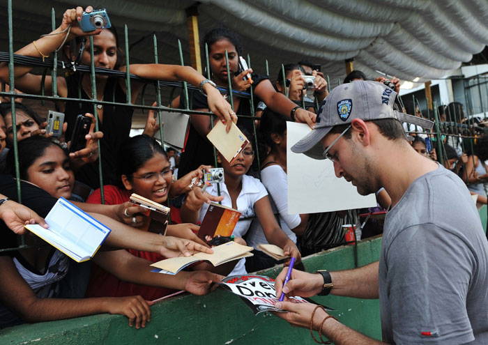 Nil Nitin Mukesh signs autographs for fans during a cricket match between Indian Bollywood actors and Sri Lankan cricketers during the three-day International Indian Film Academy (IIFA) awards events in Colombo on June 4, 2010.