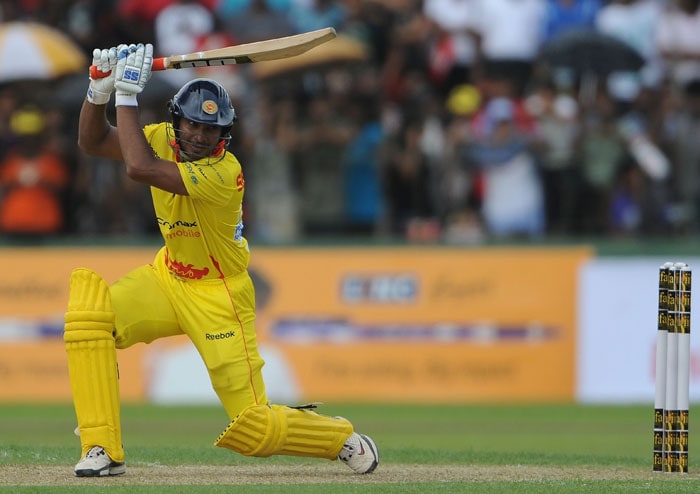 Sri Lankan cricketer Kumar Sangakara plays a shot during a cricket match between Indian Bollywood actors and Sri Lankan cricketers during the three day International Indian Film Academy (IIFA) awards events in Colombo on June 4, 2010.