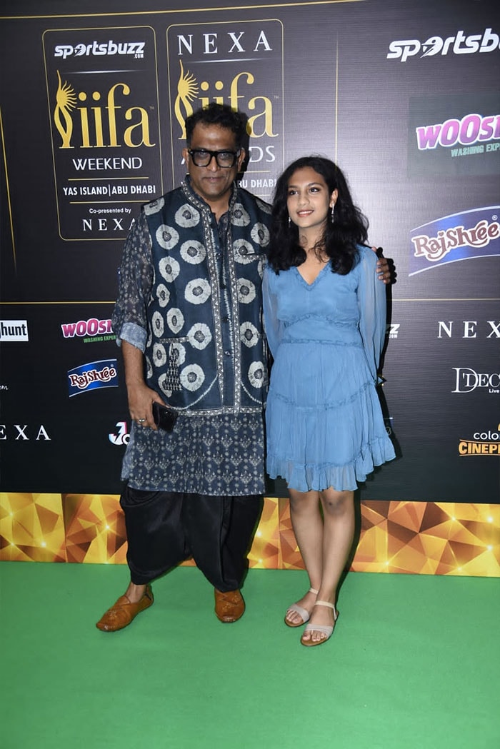 Anurag Basu posed with his daughter on the green carpet.