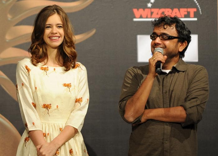 The director of <I>Shanghai</i> Dibakar Banerjee speaks to the media, as leading lady Kalki Koechlin looks on.