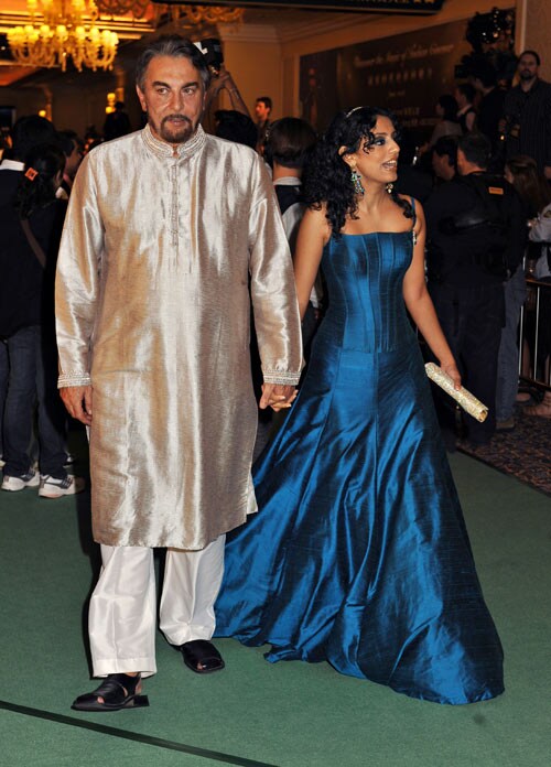 Kabir Bedi walking the green carpet with his girlfriend.  (Photo: AFP)