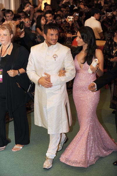 Singer Peter Andre walking the green carpet with VJ Sophie Chaudhary. (Photo: AFP)