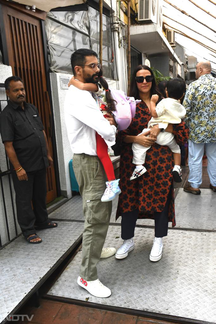 Neha Dhupia and Angad Bedi step out for some family time with their kids. (Image Courtesy: Varinder Chawla)