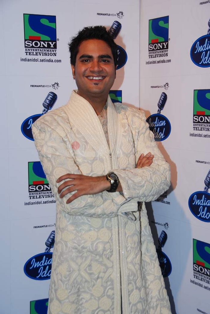 Rakesh Maini poses in style after the finale.