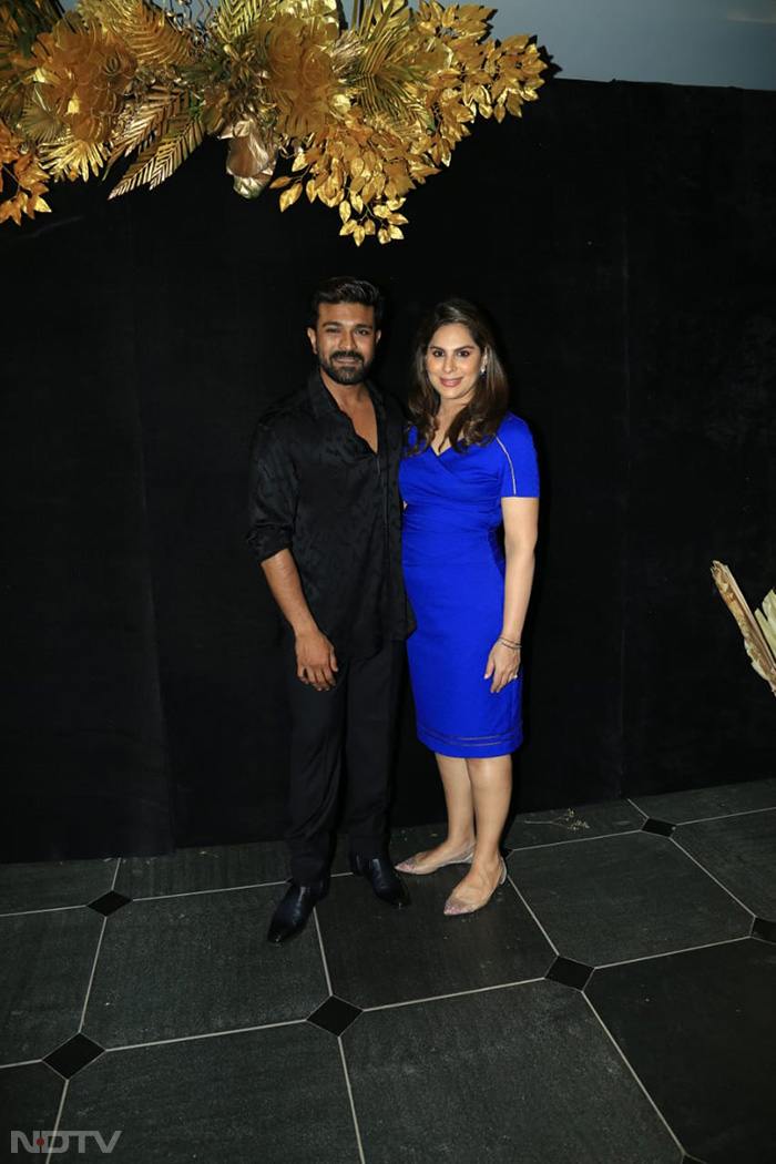 Ram Charan and wife Upasana happily posed for the cameras.(Image Courtesy: Varinder Chawla)