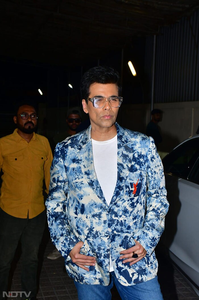 For the screening, the film's producer Karan Johar paired a blue blazer with a pair of denims. (Image Courtesy: Varinder Chawla)