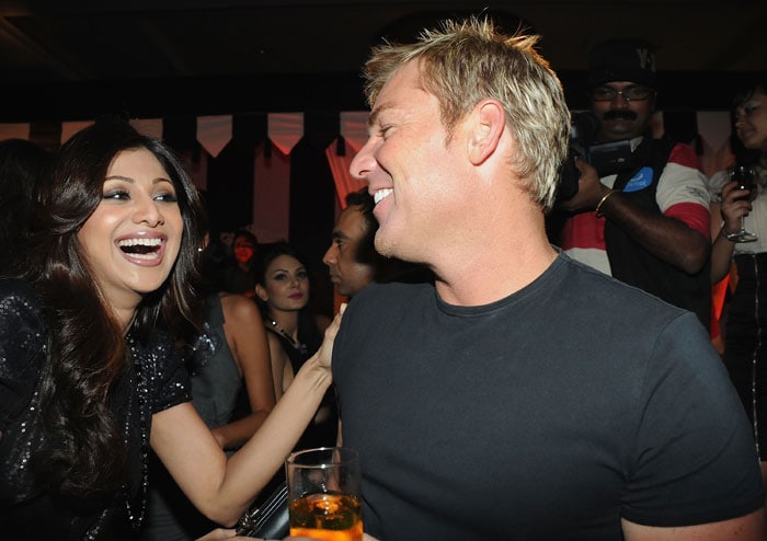 Shilpa Shetty with Shane Warne at the IPL Nights after party following the 2010 DLF Indian Premier League T20 group stage match between the Royal Challengers Bangalore and Rajasthan Royals at the ITC Gardenia in Bangalore. (Photo: IPL2010/Getty Images)