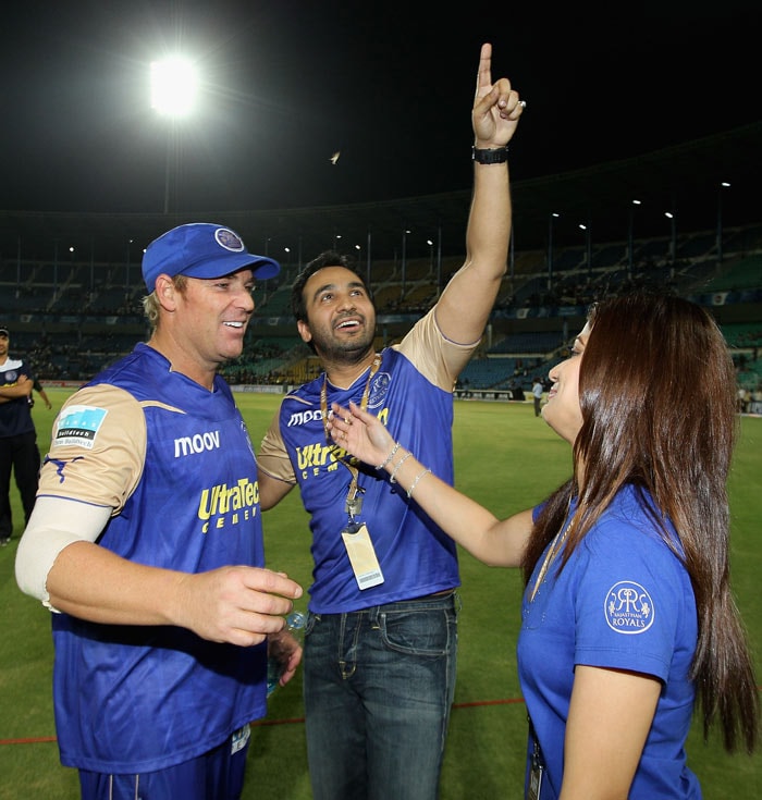 Shane Warne of the Royals is congratulated by Raj Kundra and Shamita Shetty after the 2010 DLF Indian Premier League T20 group stage match between Deccan Chargers and Rajasthan Royals played at the VCA Stadium on April 5, 2010 in Nagpur, India. (Photo: IPL2010/Getty Images)