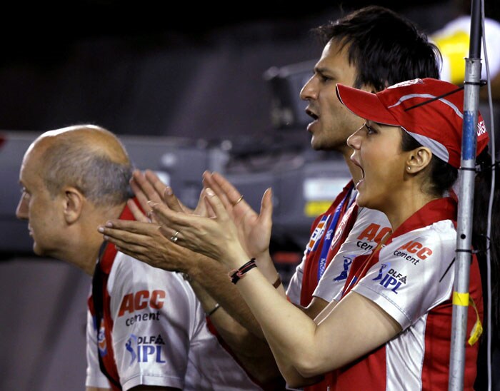 Preity Zinta, Vivek Oberoai and Anupan Kher cheer for Kings XI Punjab during the Indian Premier League 3 match against Rajasthan Royals in Mohali. (PTI Photo)