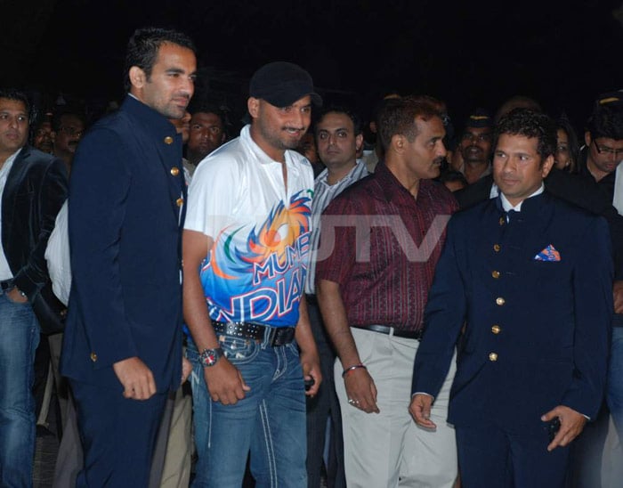 Members of Mumbai Indians Zaheer Khan and Harbhajan Singh with their captain Sachin Tendulkar.