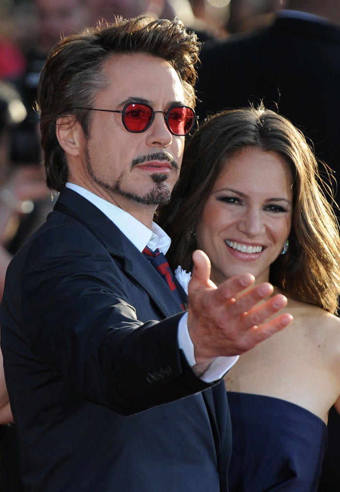 Actor Robert Downey Jr and his wife, executive producer Susan Downey (R) arrive for the world premiere of Iron Man 2 at the El Capitan Theater.