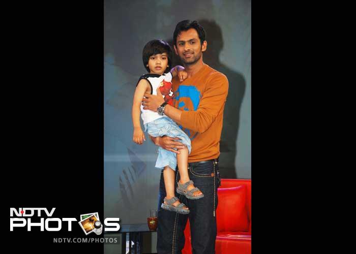 Shoaib holds Farah's son, Czar.