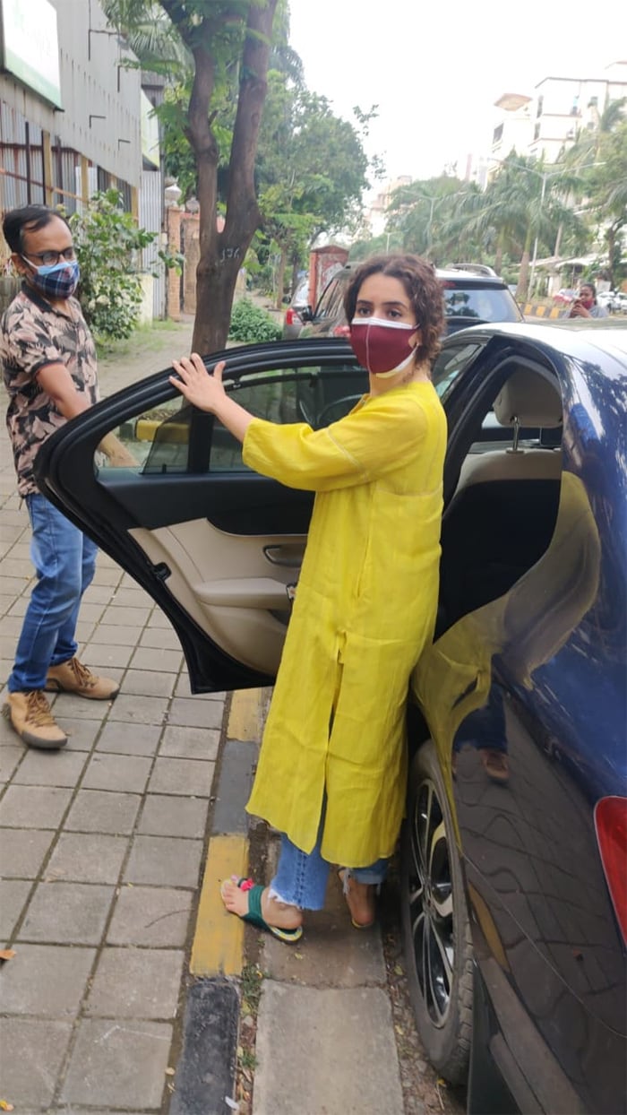 Sanya Malhotra picked out a yellow outfit as she stepped out to visit a salon in Juhu.