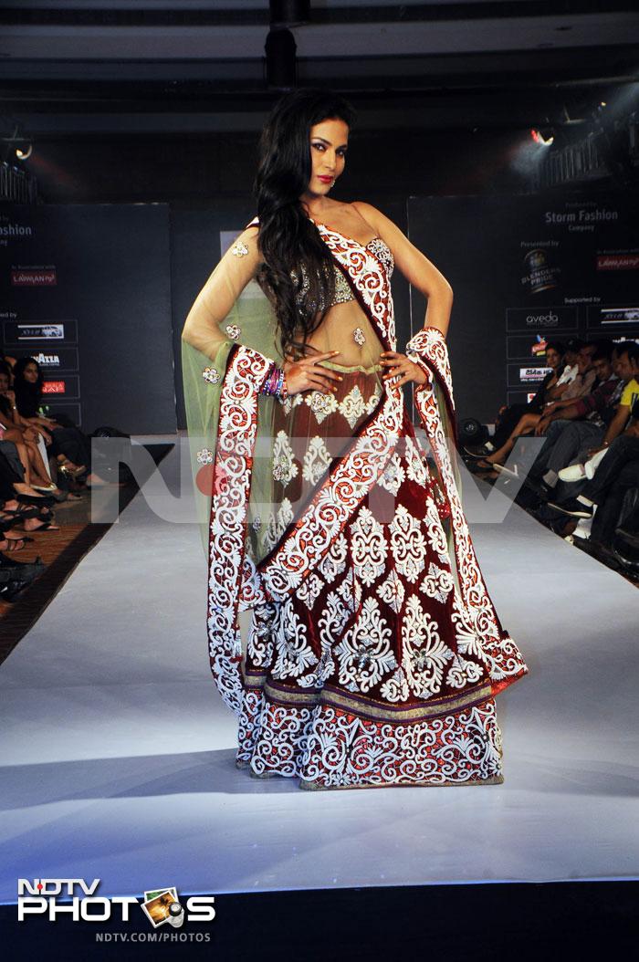 Veena Malik was the showstopper for designer duo Riyaz and Reshma Gangji's bridal line for Winter 2011 in Ludhiana.