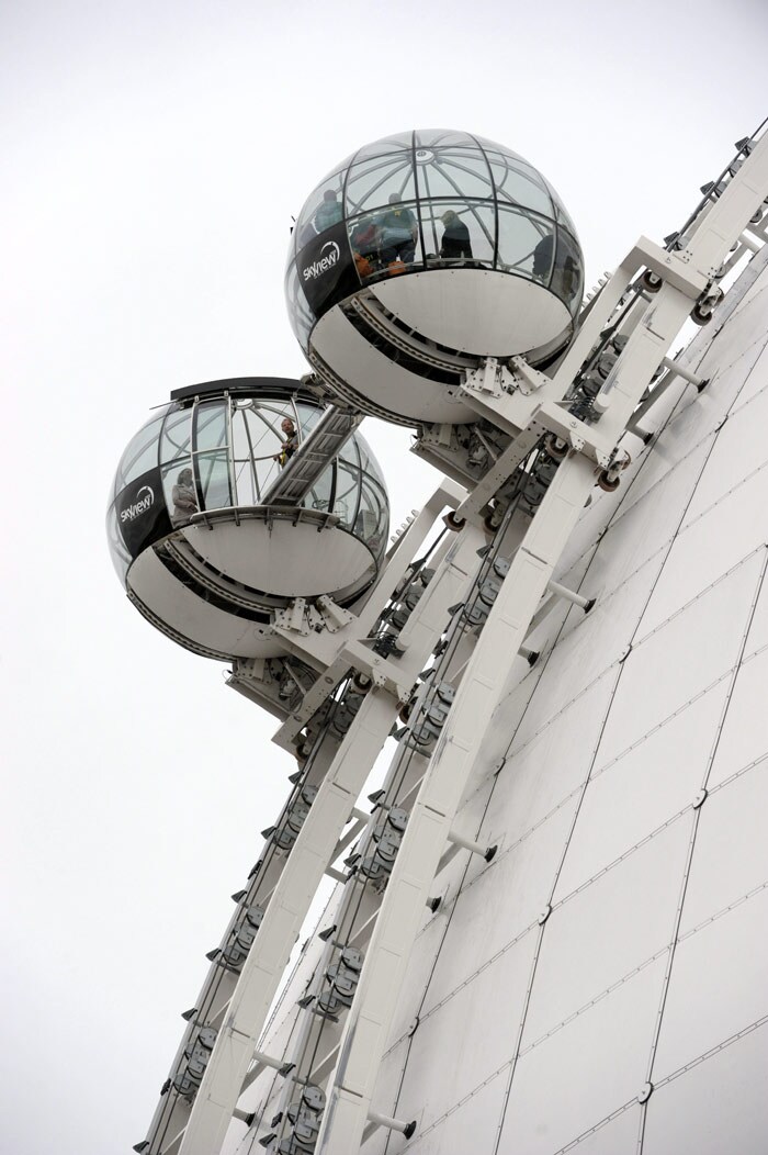 Passengers wait to be rescued from one of the Sky View lifts at a height of 40 metres on the Stockholm Globe Arena in Stockholm, on June 12, 2010. After 2 hours firefighters successfully evacuated the 15 passengers from the stuck Sky View lift to its operational twin. (Photo: AFP)