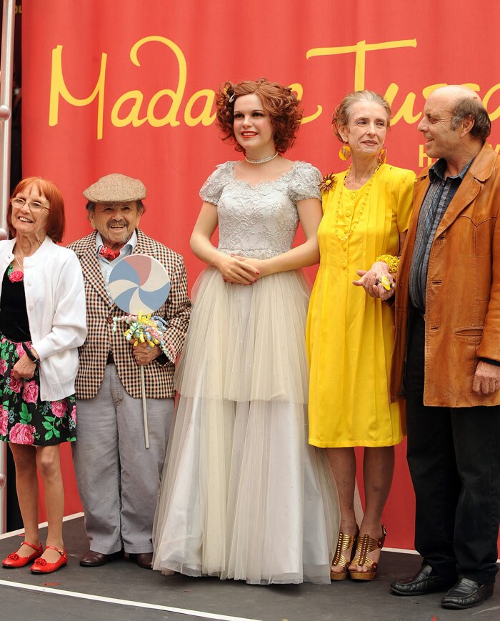 Actor Jerry Maren (2ndL), who played the Lollipop Kid as one of the Munchkins in the <i>The Wizard of Oz</i>, Maren's wife Elizabeth Barrington (L), Judy Garland's only son Joey Luft (R) and actress Margaret O'Brien (2ndR) pose with a wax figure of movie icon Judy Garland  (2ndL) at the unveiling ceremony at Madame Tussauds in the Hollywood section of Los Angeles, California on June 8, 2010. Garland, who would have celebrated her 88th birthday this year, is best know for her role as Dorothy in 1939 film classic <i>The Wizard of Oz</i>. (Photo: AFP)